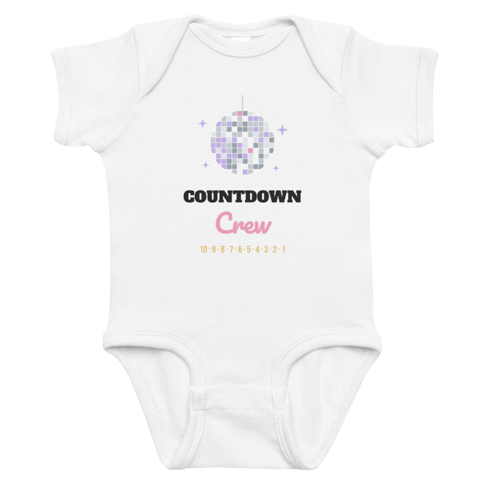 Countdown Crew Baby Onesie in white, mockup of the design printed on the front of the baby onesie