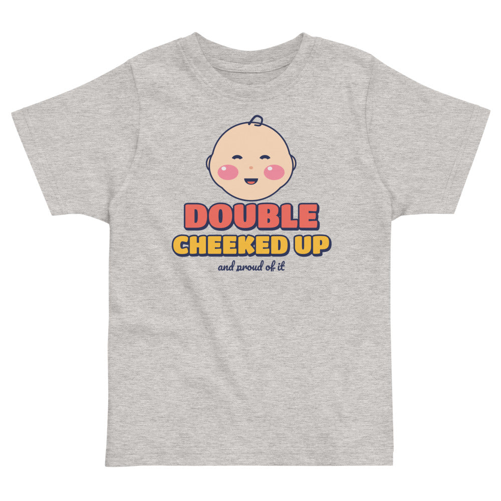 Double Cheeked Up Baby Face Toddler Tee in heather, mockup of the design printed on the front of the toddler tee