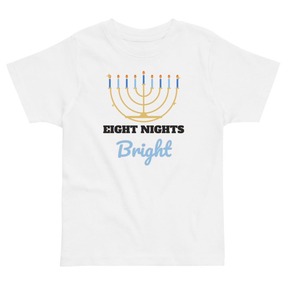 Eight Nights Bright Toddler Tee in white, mockup of the design printed on the front of the toddler tee