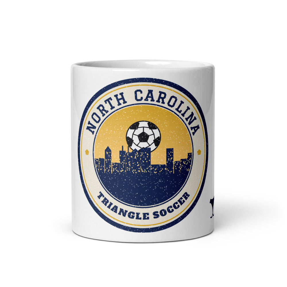 North Carolina Triangle Soccer Mug, white ceramic mug with the design printed, front view