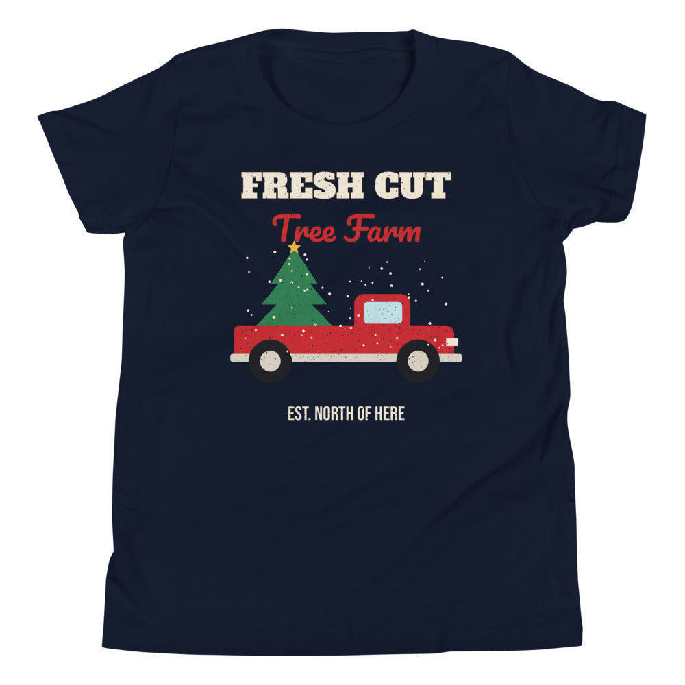 Fresh Cut Tree Farm Kids Tee in navy, mockup of the design printed on the front of the kids tee