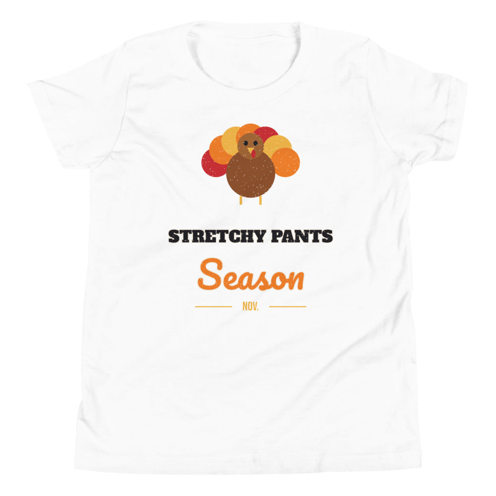 Stretchy Pants Season Kids Tee in white, mockup of the design printed on the front of the kids tee