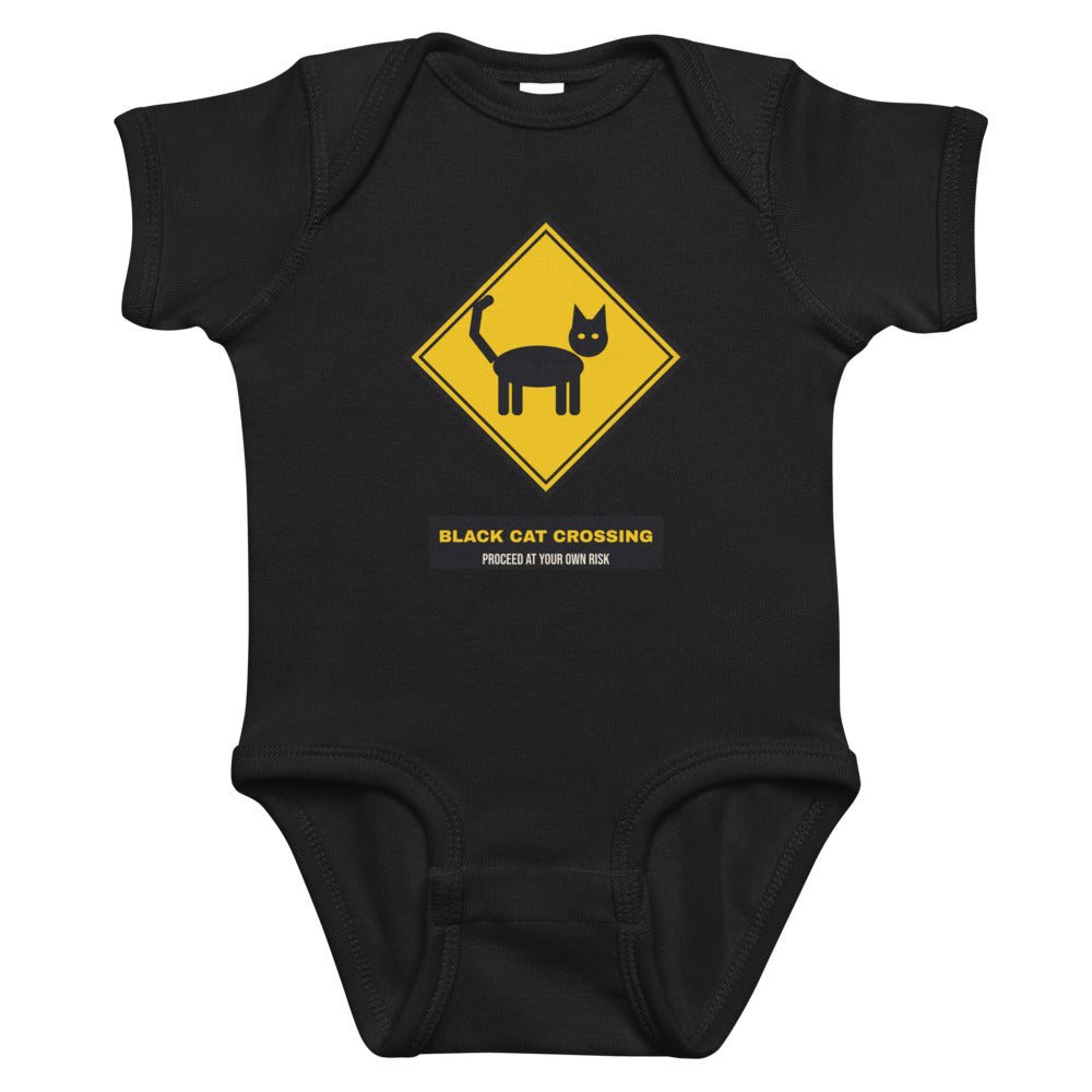 Black Cat Crossing Baby Onesie in black, mockup of the design printed on the front of the baby onesie