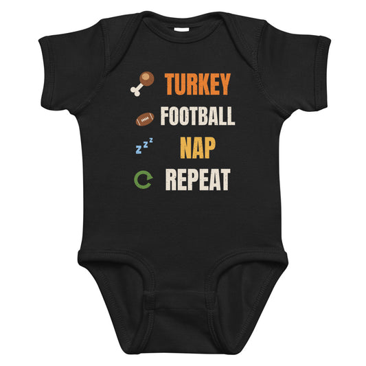 Turkey Football Nap Repeat Baby Onesie in black, mockup of the design printed on the front of the baby onesie