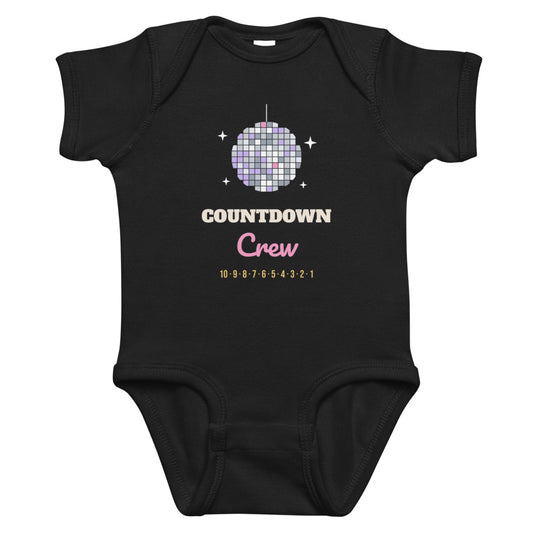 Countdown Crew Baby Onesie in black, mockup of the design printed on the front of the baby onesie