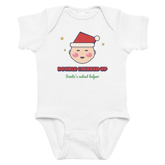 Double Cheeked Up Santa's Cutest Helper Baby Onesie in white, mockup of the design printed on the front of the baby onesie