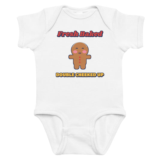 Double Cheeked Up Fresh Baked Gingerbread Baby Onesie in white, mockup of the design printed on the front of the baby onesie