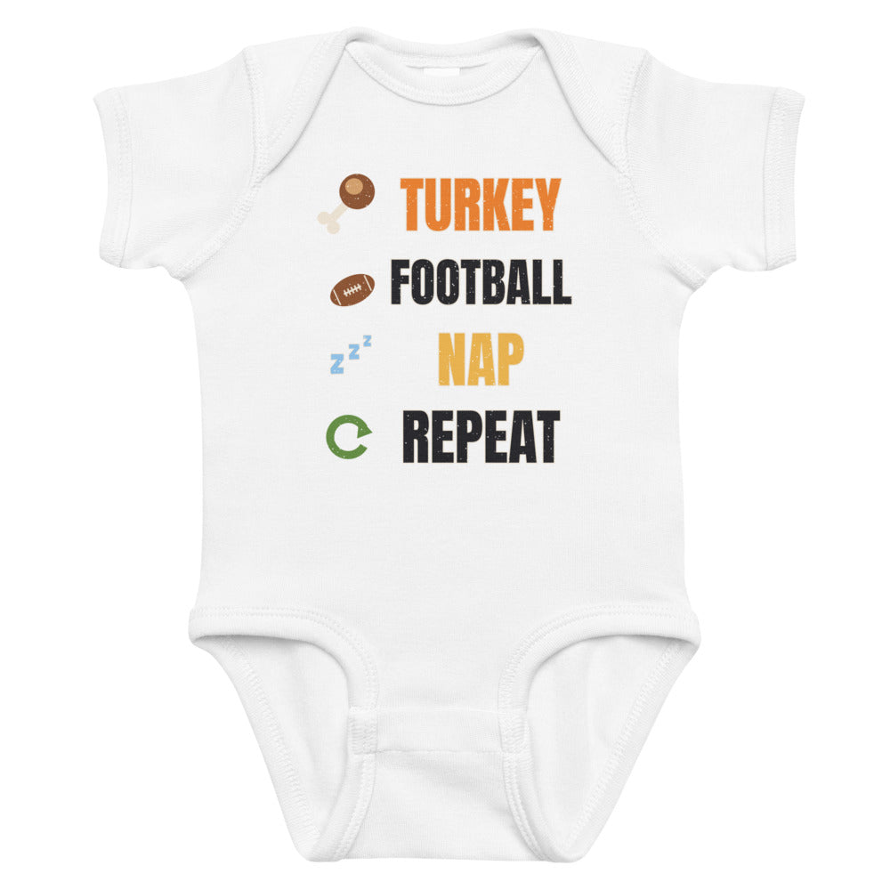 Turkey Football Nap Repeat Baby Onesie in white, mockup of the design printed on the front of the baby onesie
