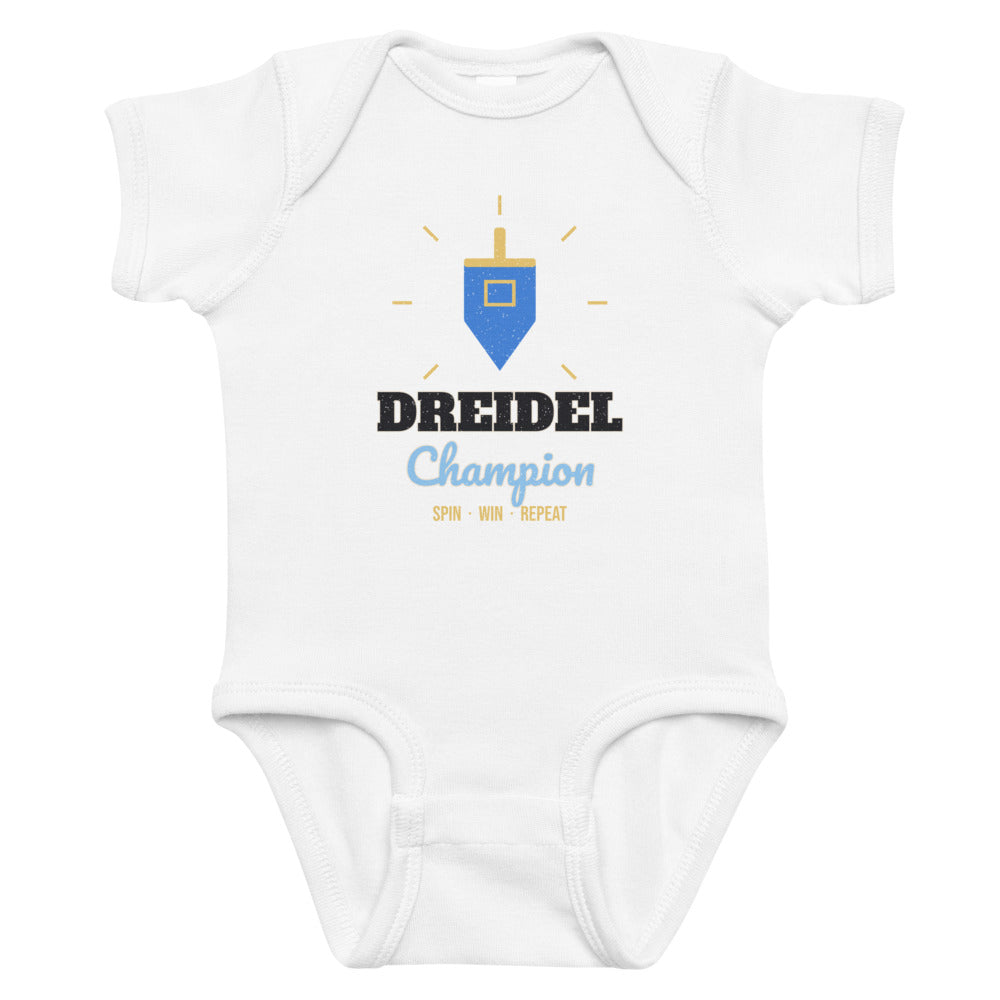 Dreidel Champion Baby Onesie in white, mockup of the design printed on the front of the baby onesie