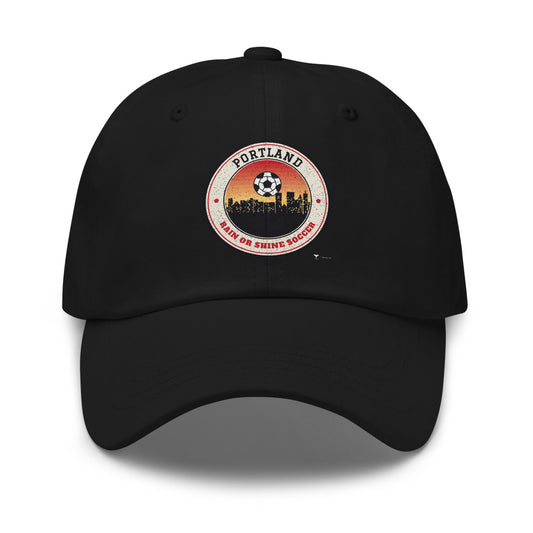 Portland Rain or Shine Soccer Dad Hat in black, design printed on the front panel, front view