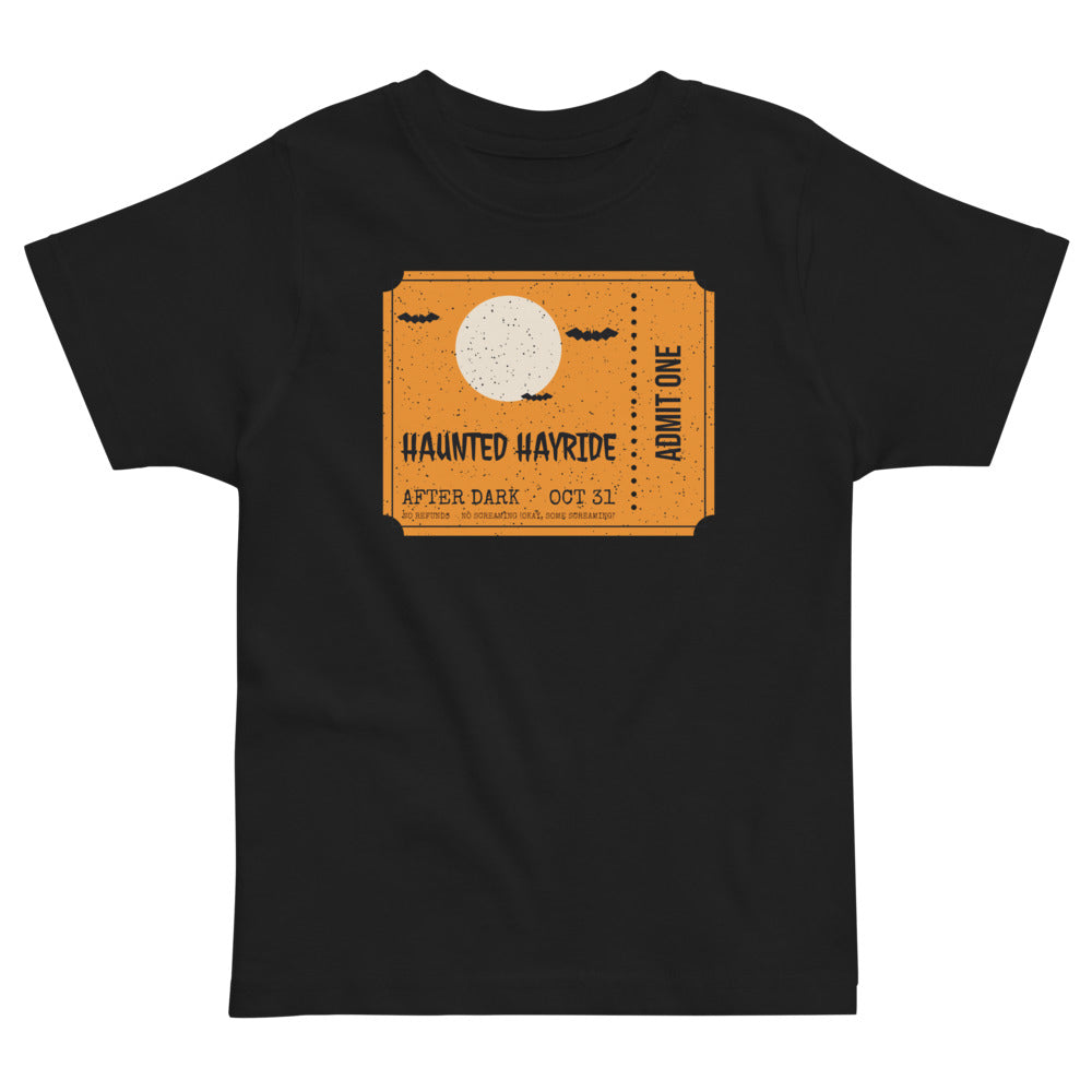 Haunted Hayride Toddler Tee in black, mockup of the design printed on the front of the toddler tee