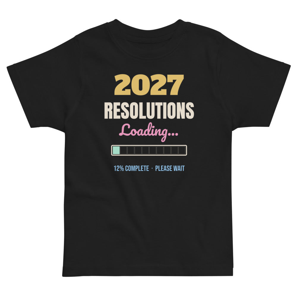 2027 Resolutions Loading Toddler Tee in black, mockup of the design printed on the front of the toddler tee
