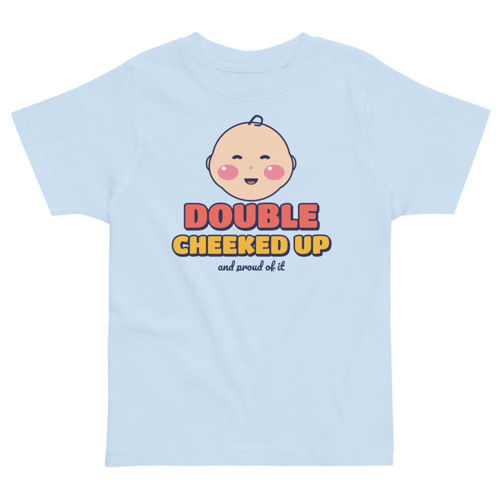 Double Cheeked Up Baby Face Toddler Tee in light blue, mockup of the design printed on the front of the toddler tee