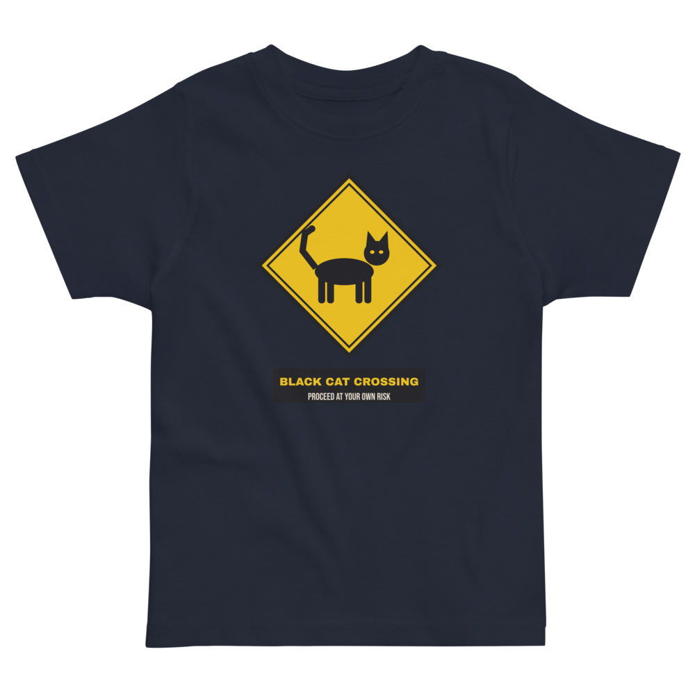 Black Cat Crossing Toddler Tee in navy, mockup of the design printed on the front of the toddler tee
