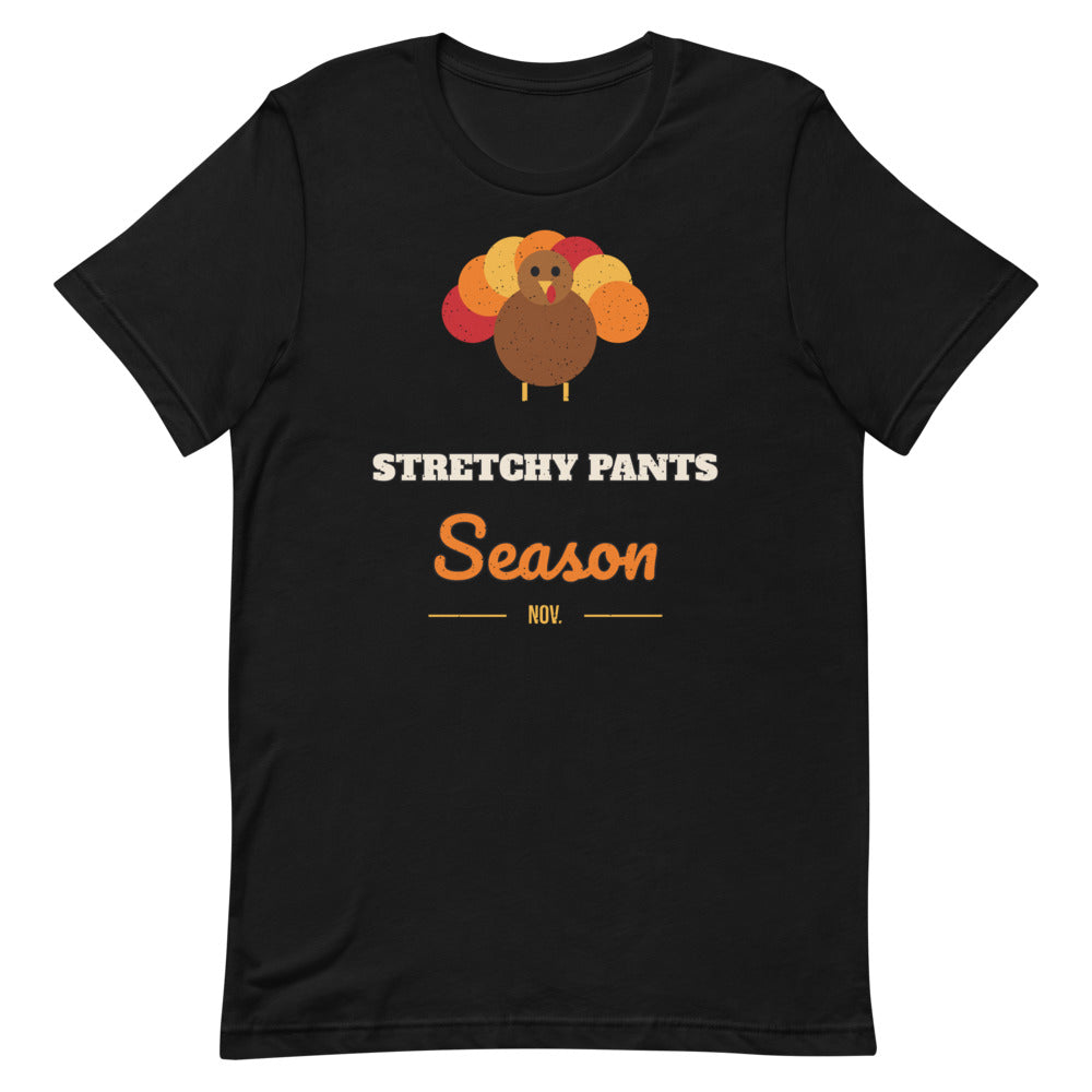 Stretchy Pants Season Unisex Tee in black, design printed on the front, front view