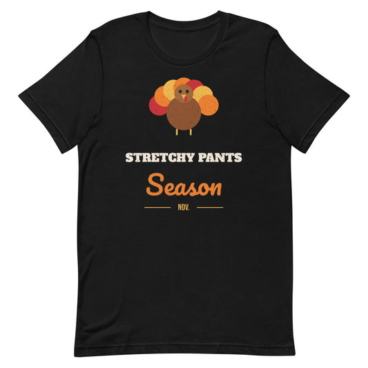 Stretchy Pants Season Unisex Tee in black, design printed on the front, front view