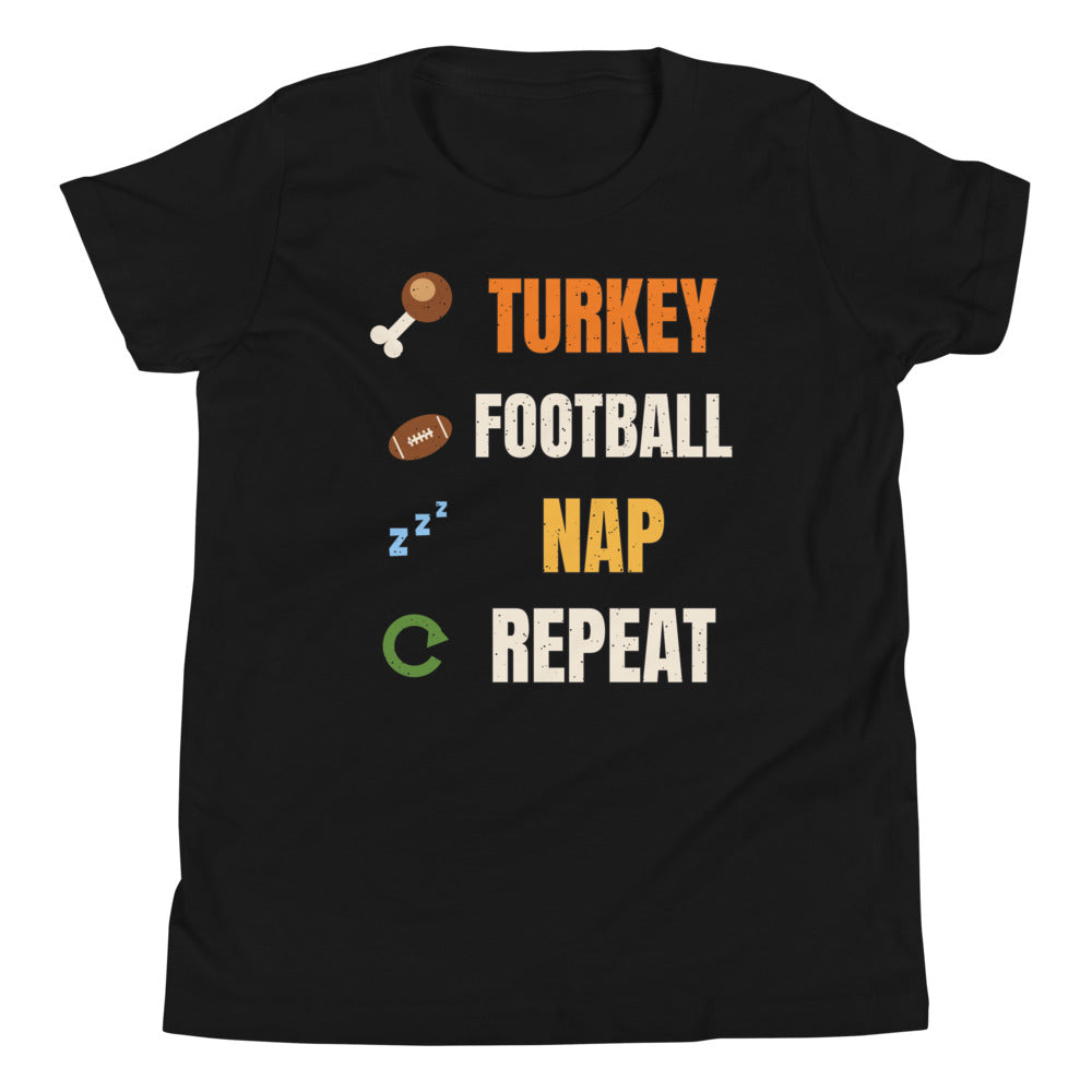 Turkey Football Nap Repeat Kids Tee in black, mockup of the design printed on the front of the kids tee