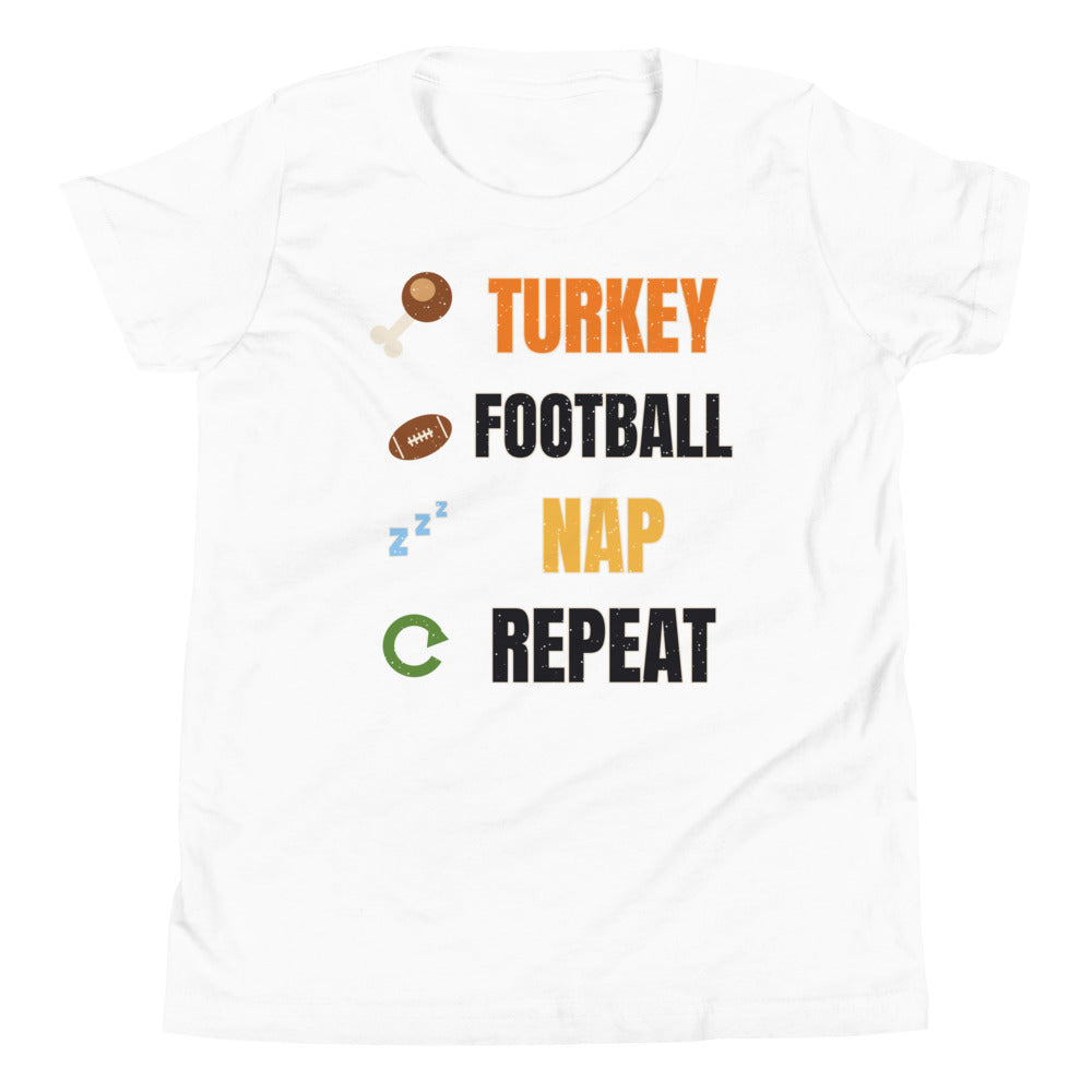 Turkey Football Nap Repeat Kids Tee in white, mockup of the design printed on the front of the kids tee